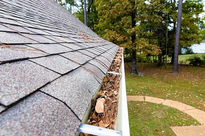 maintaining home's exterior with gutter cleaning